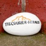 Tiny logo, tiny news. Photo courtesy Ray Miller-Still