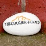 Tiny logo, tiny news. Photo courtesy Ray Miller-Still