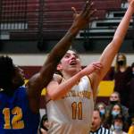 Rylan Donovan, right, a senior member of the White River Boy's Basketball team, is the team's Most Valuable Player this year. (File photo)