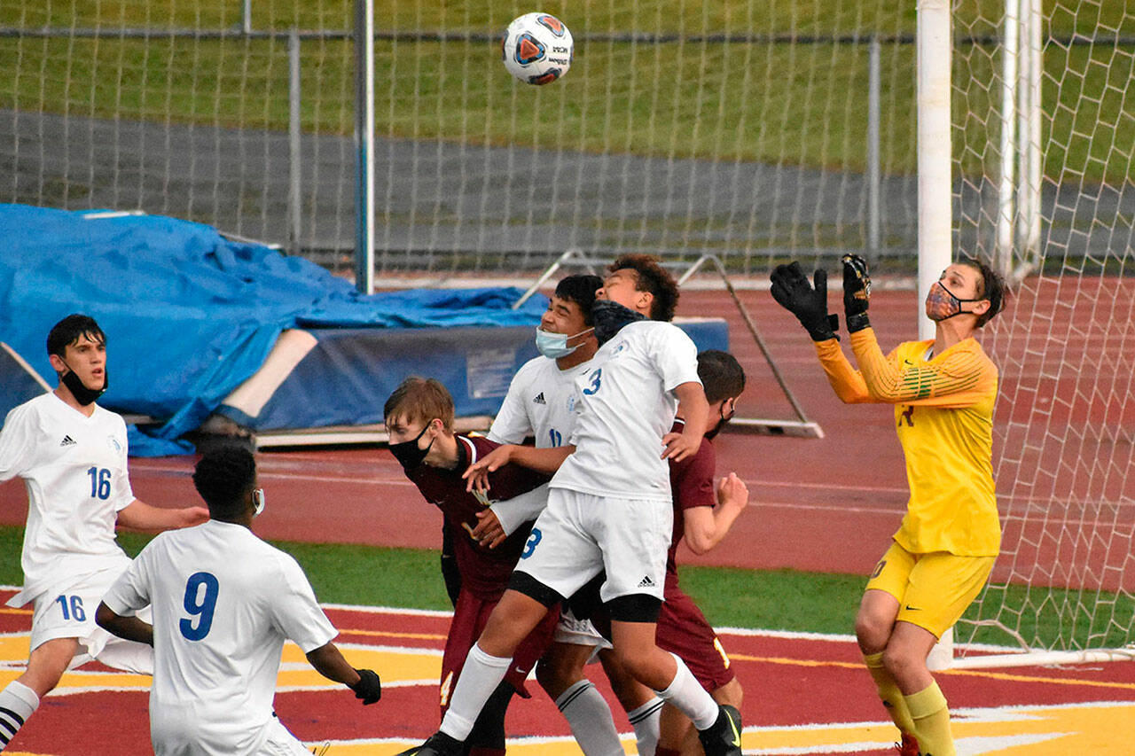 White Rivers Nick Panin returns this year as a senior goalkeeper. Pictured is a 2021 game against the Trojans. Photo by Kevin Hanson