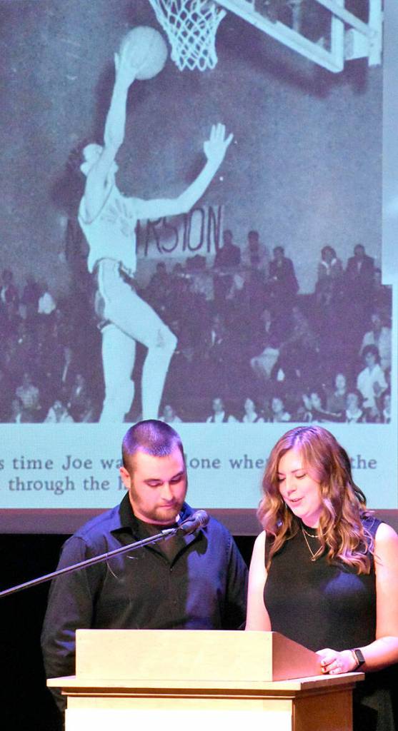 Grandchildren Marcus Rodriguez and Danielle Markle deliver comments on Hall of Fame inductee Joe Kolisch. Photo by Kevin Hanson
