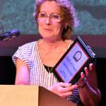 Cindy (Browning) Meyer, a two-time state champion at WRHS, accepts her award at the induction ceremony. Photo by Kevin Hanson