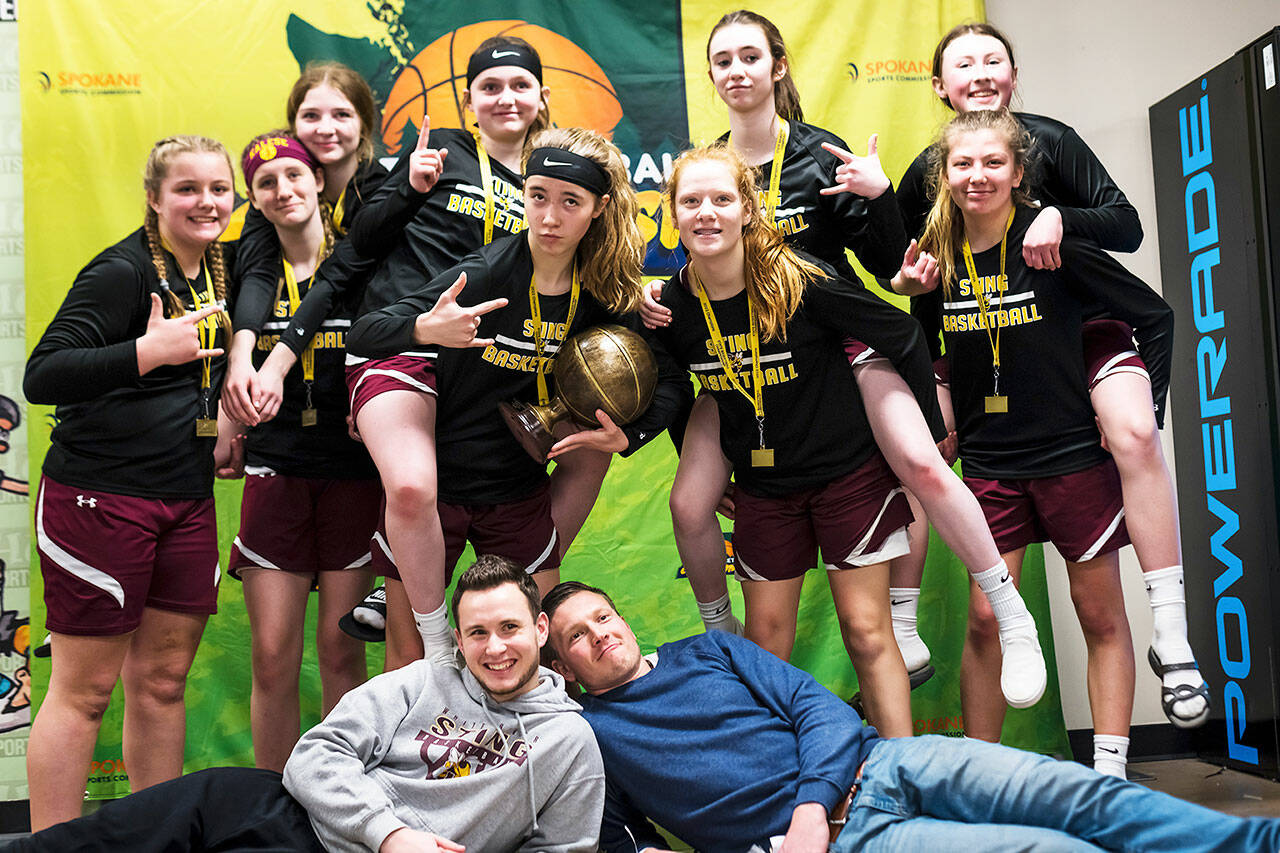 The White River Sting team. Back row, from left: Madelyn Jameyson, Kalese Turgeon, Charley Cochran, Addy Walthers, Maggee Schmitz, Malia Froemke, Macie Doyle, Myia Olson, and Kaidyn Johnson. Bottom: Coaches Brandon Scarpaci and Cory Anderson. Photo by Keelyn Turgeon / <a href="http://www.bluestellar.com" target="_blank">www.bluestellar.com</a>