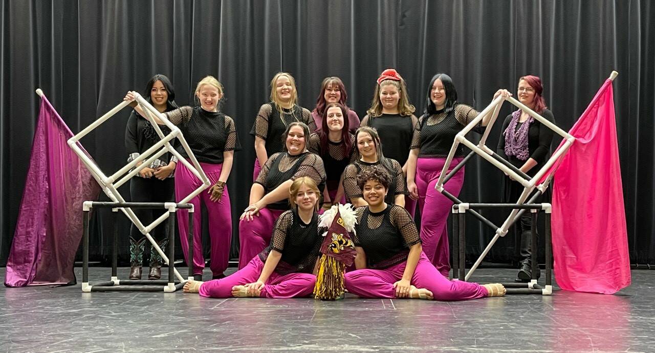 Members of Enumclaw High Schools color guard team this year include: (back row) assistant coach Sage Beinke, Emma Riche, Isabelle Riche, Cheryl Richenburg, Reese Hooton, Addisyn Akeson and assistant coach Cassie Grove; (middle row) Sophia Delducco, Nicole Ross, and Leah Lidke; and (front row) Olivia Marity and Adele Razor. Courtesy photo