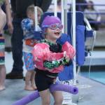 Whether you're at the pool or the beach, water safety is paramount — which is why the Enumclaw Aquatic Center hosted April Pool's Day on April 16, teaching kids of all ages the importance of a properly-fitted life jacket, how to rescue someone with a life preserver, and how to get in and out of a boat safely. Pictured is Eve Funk, rocking her her pool fit. Photo by Ray Miller-Still