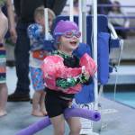 Whether youre at the pool or the beach, water safety is paramount  which is why the Enumclaw Aquatic Center hosted April Pools Day on April 16, teaching kids of all ages the importance of a properly-fitted life jacket, how to rescue someone with a life preserver, and how to get in and out of a boat safely. Pictured is Eve Funk, rocking her her pool fit. Photo by Ray Miller-Still