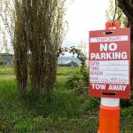 Parking may be difficult to find tomorrow, April 29, as the library lot is closed. As more construction happens to this area, additional closures may be expected. Photo by Ray Miller-Still