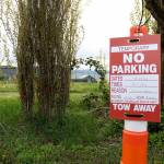 Parking may be difficult to find tomorrow, April 29, as the library lot is closed. As more construction happens in this area, additional closures may be coming. Photo by Ray Miller-Still