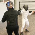 Kurt Dunning running drills with his son, Karl, at the local Danish Hall, where classes are currently being held. Photo by Ray Miller-Still