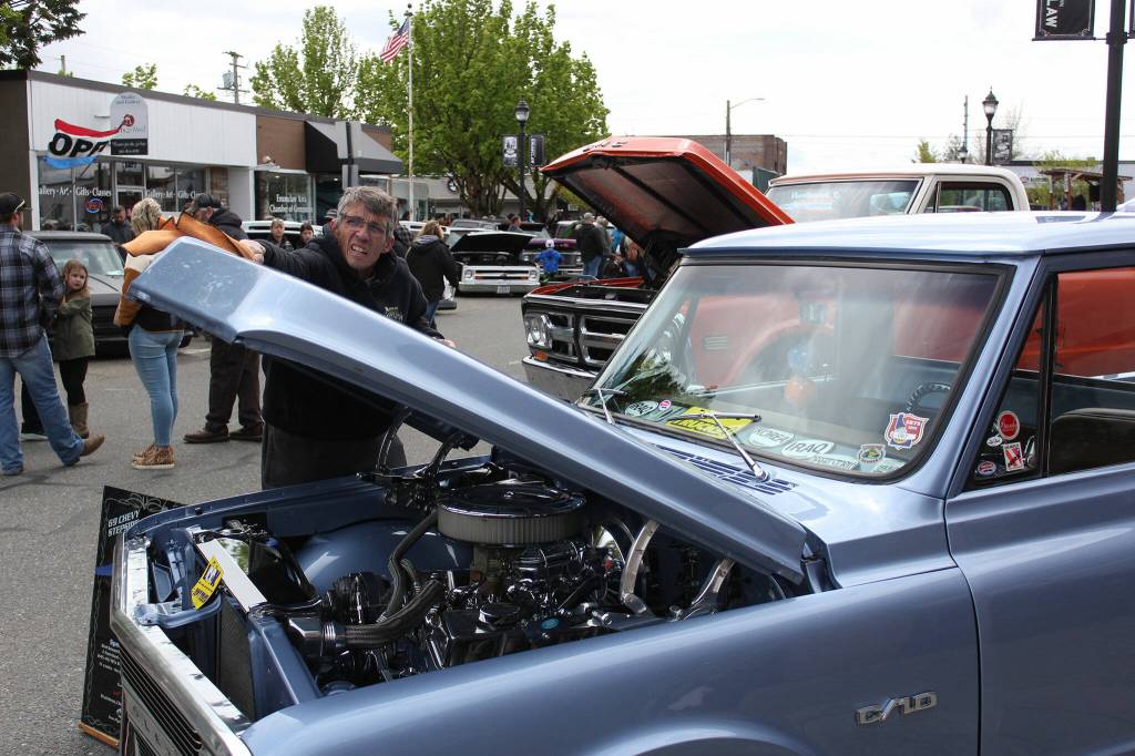 Michael Johnson stayed busy Saturday wiping his '69 Chevy Stepside clean at the Northwest C10 Classic Truck Show.