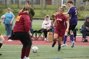 White River put up a strong fight but ultimately took second place against the first-place Puyallup Vikings at the Special Olympics Unified Soccer League district tournament in Enumclaw on Saturday, May 14. The Enumclaw Hornets, meanwhile, took third. The Unified Sports program pairs a roughly equal number of athletes with intellectual disabilities with partners who dont have intellectual disabilities for training and competition. Pictured is Makenzie Baker (No. 1) and Sebastien Cox (No. 6). Photo by Alex Bruell.