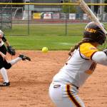 PHOTO BY KEVIN HANSON
The SPSL 2A fastpitch season is now in the books, with postseason play set to begin begin this week. Plateau rivals Enumclaw High and White River met twice last week, on May 11 at the Boise Creek Sixplex and two days later on the White River campus. In this Friday photo, Enumclaw starting pitcher Emilie Crimmins delivers to White River's Megan Klapperich.