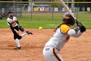 PHOTO BY KEVIN HANSON
The SPSL 2A fastpitch season is now in the books, with postseason play set to begin begin this week. Plateau rivals Enumclaw High and White River met twice last week, on May 11 at the Boise Creek Sixplex and two days later on the White River campus. In this Friday photo, Enumclaw starting pitcher Emilie Crimmins delivers to White River's Megan Klapperich.