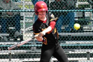 Enumclaw's Kaylee Henry puts a ball into play during Enumclaw's Friday afternoon loss to the Fife Trojans. Photo by Kevin Hanson