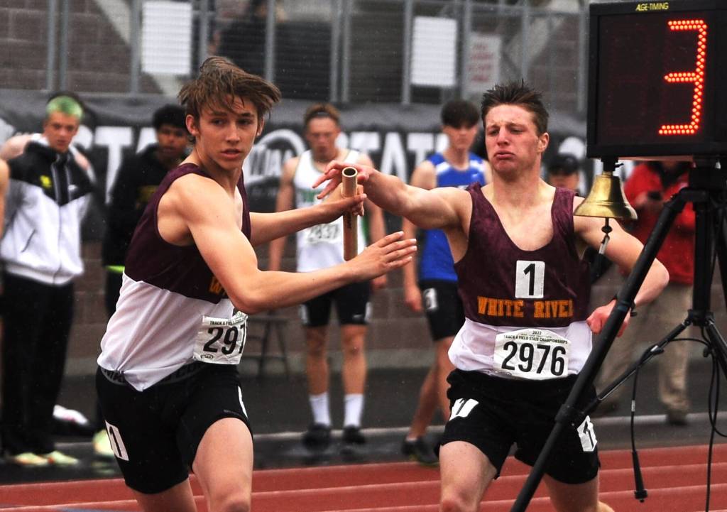 White River runners make the final handoff in the 4x100 relay at the state Class 2A track and field championships. Photo by Michael Dashiell, Sequim Gazette.