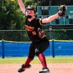 Enumclaw High junior Emilie Crimmins was named the leagues Pitcher of the Year. In this photo, she delivers during the Class 2A state tournament. Photo by Kevin Hanson