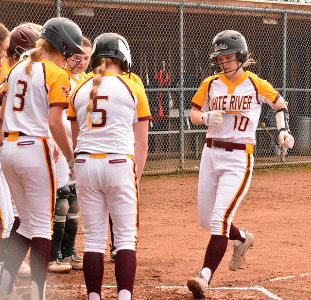 Ella Lidstrom (10) was named the SPSL 2As Most Valuable Player. Here, she is greeted by teammates after hitting an early-season home run. Photo by Kevin Hanson