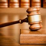 gavel and sounding block on desk