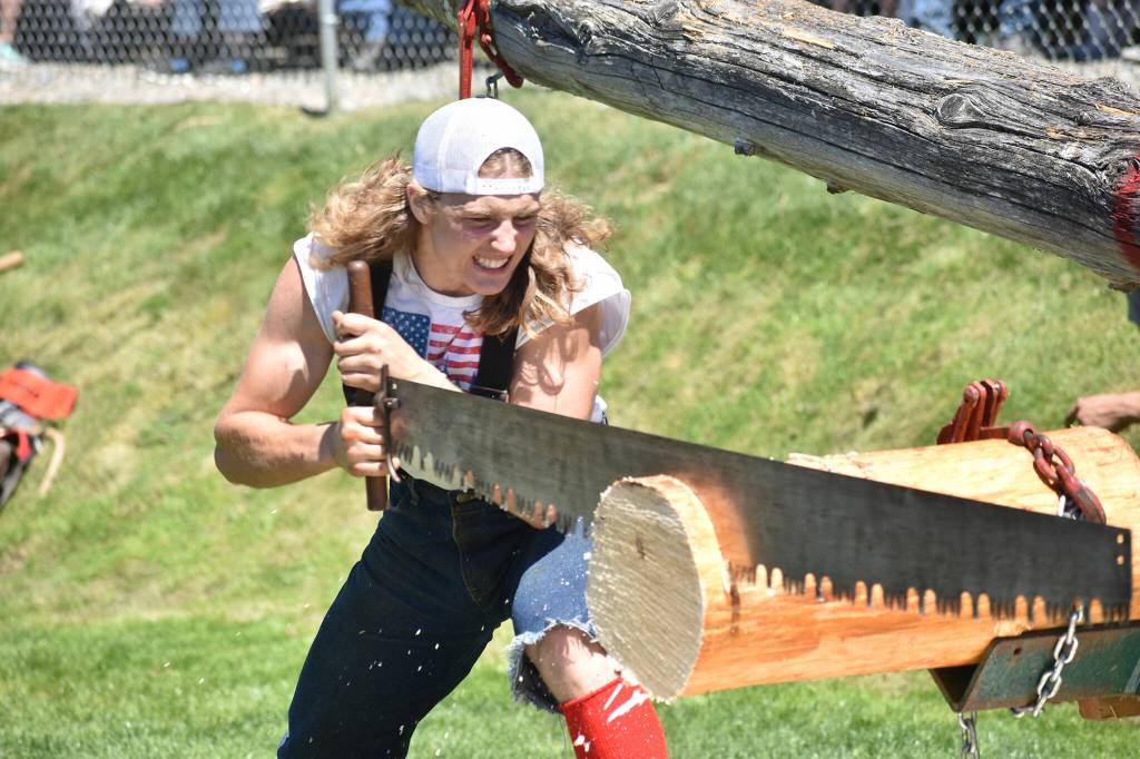 Bo Carlson in the single bucking event. Photo by Alex Bruell.