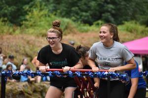 The Wilkeson Handcar Races involves teams of two or four racing across a roughly 410-foot long track of railroad; the average speed of the cars reaches around 20 mph. Photo by Alex Bruell