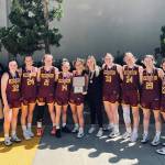 The White River varsity squad won five straight games in San Diego to take the tournament championship. Making up the squad were (from left) coach Chris Gibson, Dakota Sprouse, Josie Jacobs, Ava Bright, Lexie Banks, Morgan Greene, Mackenzie Hinson, Ella Klemkow, Vivian Kingston, Ally Green, Jadyn Olson, and assistant coach Rani Wiegand. Submitted photo
