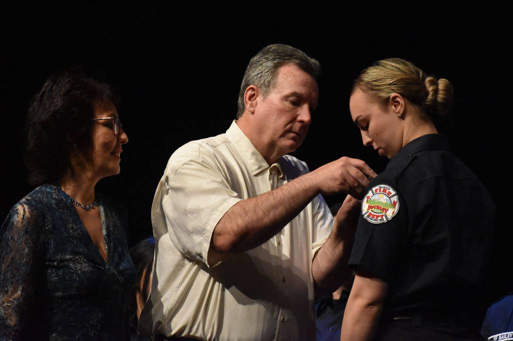 Krystal Robbins is pinned during the ceremony.