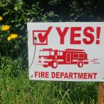 Signs asking locals to support their fire department have gone up around Enumclaw. Photo by Ray Miller-Still