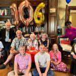 Hilde Bruells family and friends sit with her for a photo at her 106th birthday celebration.