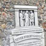 A closeup of the artwork featured in the Never Forget Garden plaque. Photo by Alex Bruell.