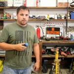 Jason Wood holds up one of the rubber bullets left behind from when deputies arrested Aaron Ray Lincoln on July 12. Photo by Ray Miller-Still