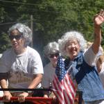 A team of Golden Girls-inspired racers celebrates on the way back from their trek down the tracks. Photo by Alex Bruell