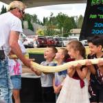 The slippery and scaled denizens of Reptile Isle paid a visit to Buckley on Thursday, Aug. 4, delighting a crowd of nearly 100 kids and adults. The traveling animal show, hosted last week in Buckley through the city’s Youth Activity Center, introduces young people to exotic animals and the principles of nature conservation. On display in Buckley were a gecko, a giant Galapagos tortoise, a Komodo Dragon and Chiquita, the albino Burmese python, among other animals. Photos by Alex Bruell