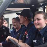 Photos by Alex Bruell 
Firefighters check out the new side-by-side at its unveiling in Wilkeson.