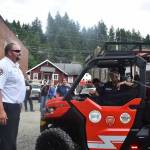 Assistant Chief Johan Olson gets splashed by a fellow firefighter using the new UTVs water hose.