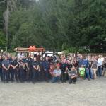 Members of the Buckley Fire Department and Wilkeson community pose for a group photo with the new side-by-side.