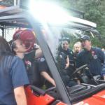 Firefighters check out the new side-by-side at its unveiling in Wilkeson. Photo by Alex Bruell