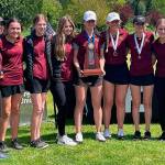 Repeating last years success could be an uphill battle, with many veteran golf players having graduated. Pictured is Coach Anna Rose, Alle Kelmkow, Sophie Ross, Abby Rose, state champion Brooke Gelinas (graduated), Brooke Mahler (graduated), Lexie Mahler, and Emily Moser after last years state tournament. Photo courtesy White River High School