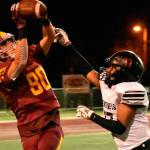 Enumclaw High remained undefeated last week with a home-field victory over Steilacoom. Here, Karson Holt goes high for a reception. Photo by Kevin Hanson