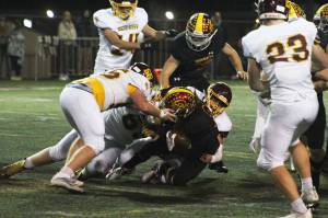 Enumclaw took the W at last years Battle of the Bridge game 31-6; will White River be able to take back the trophy? Photo by Ray Miller-Still