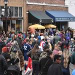 Cole Street filled with ghosts, ghouls and a surprising number of Tyrannosaurus Rexes the evening of Halloween. Photo by Alex Bruell.