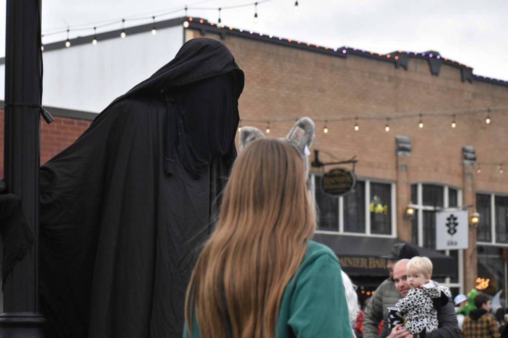 Standing feet above most in one of the scarier  and more impressive  costumes of the night was city councilmember Beau Chevassus as a Dementor from the Harry Potter series. Photo by Alex Bruell.