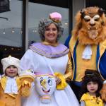 Nicole and Desmond Weaver, dressed as Belle and the Beast, and their children Carter, 4 and Dalton, 6, were among the snazziest dressed at the Halloween event Monday. Photo by Alex Bruell.