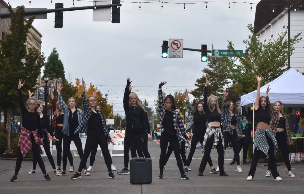 The dancers of the Plateau Ballet Repertory Theatre put on several performances of Thriller Monday night, leaping, screaming and twirling to the delight of visitors on Cole Street. Photo by Alex Bruell.