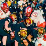 A swarm of Hornets smother another Othello rushing attempt. Photo by Kevin Hanson