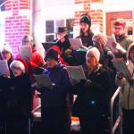 Dozens of people gathered at Enumclaws city hall last Saturday for the annual Christmas tree lighting, complete with hot beverages, snacks, and the Cascade Foothills Chorale singing carols. Photos by Ray Miller-Still
