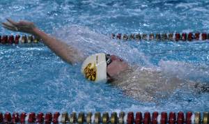 PHOTOS BY KEVIN HANSON
The Enumclaw Aquatic Center played host the afternoon of Dec. 15 to a three-team swim meet that involved local athletes from Enumclaw and White River high schools, along with Tacoma's Foss Falcons. In these photos, White River's Evan Weisheyer competes in the 200-yard freestyle and Enumclaw's McCade Walker takes part in the 100-yard backstroke. The Plateau athletes now take a break until Jan. 5 when they host the Franklin Pierce Cardinals and Washington Patriots.