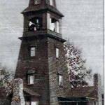 This photo, dated 1912, shows L. Robinson's tower. Image via Enumclaw Library Historical Collection.