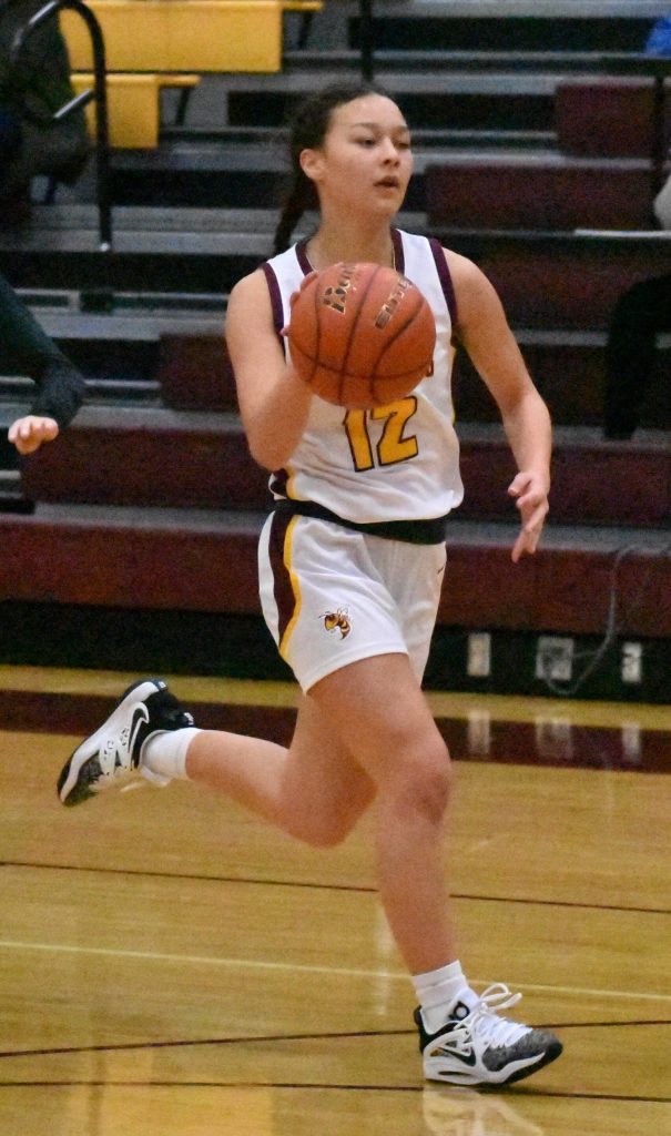 PHOTOS BY KEVIN HANSON The Plateaus four high school basketball teams - thats boys and girls squads from both Enumclaw and White River high schools - found great success during the early part of the 2022-23 season. Some of the key contributors are pictured here, taken during December contests. They are White River senior Morgan Greene (#12), White River junior Colin Schmidtke (#10), Enumclaw senior Noah Seabrands (#4) and Enumclaw senior Charlee Torgison (#11).