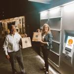 Courtesy photo
Pierce County Council member Dave Morell and his assistant Judy Hurley, who lobbied the county to fund The Markets locker, pick up an order of fresh food.