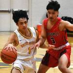 The White River High gym was home to a Friday night doubleheader between the Hornets and the visiting Franklin Pierce Cardinals. White River won both ends, the boys in a squeaker and the girls in a blowout.